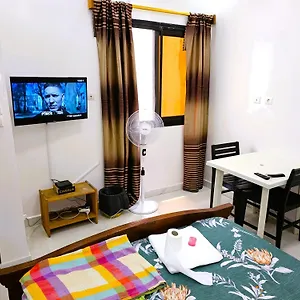 Chambre Ngor- Douche Privee-salon-cuisine-netflix Maison d'hôtes